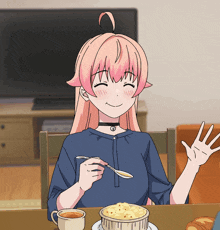 a girl with pink hair is sitting at a table with a cup of coffee and a bowl of macaroni and cheese