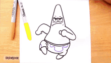 a person is drawing patrick from spongebob squarepants