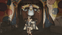a man stands in front of a sign that reads show talent