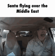 Santa Santa Flying Over GIF - Santa Santa Flying Over Santa Flying Over The Middle East GIFs