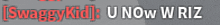 a blurred image of a sign that says ' swaggy kid uno w riz '