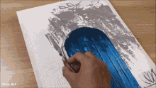 a person is painting a blue door on a canvas with wow art written on the bottom right