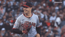 a baseball player for the cleveland indians smiles