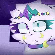 a close up of a cartoon cat with a crown on its head and a necklace .