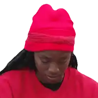 a woman wearing a red headband and a red shirt