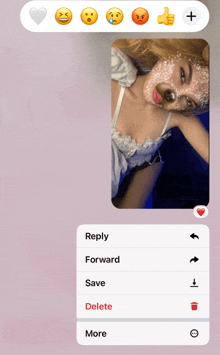 a screenshot of a woman 's face with smiley faces and the words reply forward save delete and more at the bottom