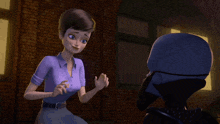 a woman in a purple shirt is talking to a man in a black helmet