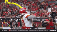 a football game is being played on cbs