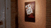 a poster on a wall that says nail em on it