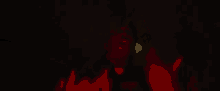 a person wearing a red jersey with the number 20 on it is standing in the dark .