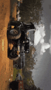 a zimbabwe jeep is parked in a dirt area
