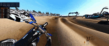 a person riding a dirt bike with the number 7 on the handlebar