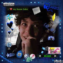 a picture of a boy in a car with the words i love my game cube at the top