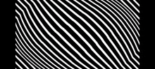 a black and white striped pattern with a swirl in the middle .