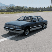 a car is parked on the side of the road with mountains in the background