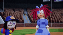 two stuffed dolls are standing on a baseball field with a crowd behind them