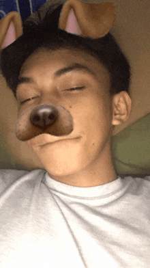 a young man wearing a dog mask with ears