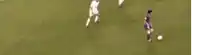 a blurry picture of a soccer game with players playing on a field