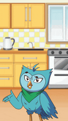 a blue bird with a green scarf around its neck stands in front of a kitchen