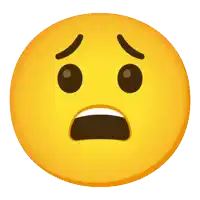 a yellow smiley face with a surprised expression on it