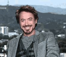 Robert Downey Jr Laugh GIF - Robert Downey Jr Laugh Thumbs Up GIFs
