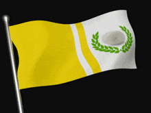 a yellow and white flag with a laurel wreath and a rock on it