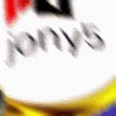 a blurry picture of a bottle of tonic