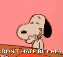 snoopy is sitting at a table with his eyes closed and a toothbrush in his mouth .