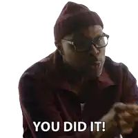 a man wearing glasses and a beanie is saying you did it