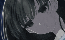 a close up of a girl 's face with a tear running down her cheek