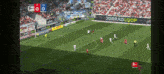 a soccer game is being played with a jobrad loop ad in the background