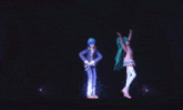 a couple of anime characters are dancing together on a stage .
