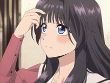 a girl with long black hair and blue eyes is scratching her forehead