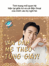 a man making a heart shape with his hands and the words van dam me theo tung giay