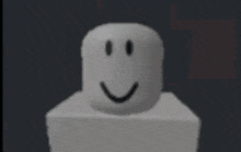 a white object with a smiley face on it is sitting on top of a table .