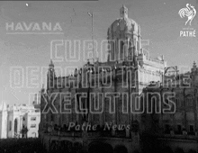 a black and white photo of a building with the words havana on the top