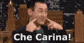 a man covering his ears with his hands and the words che carina