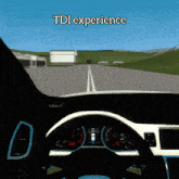 a screenshot of a car driving down a road with the words tdi experience at the top