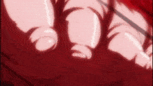 a close up of a person 's feet with a red background and a blurred background .