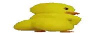 a pixelated image of a yellow duck with red feet