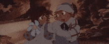 two cartoon characters are standing next to each other holding a baby .
