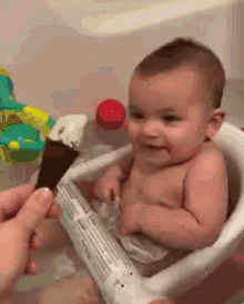 Miss Hr Baby Ice Cream GIF - Miss Hr Baby Ice Cream Baby Bath GIFs