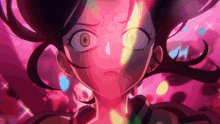 a close up of a girl 's face with a glowing pink background