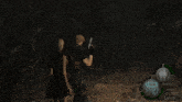 ashley and leon are playing a video game with a gun