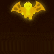 a yellow bat with wings is glowing in the dark on a dark background .