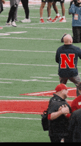 a man with the letter n on his back