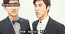 two men in suits and bow ties are standing next to each other and one of them is asking the other how about me .