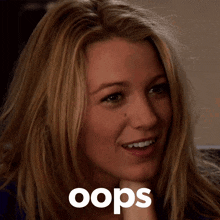 a close up of a woman 's face with the word oops in the corner