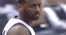 a close up of a man 's face with the word playoffs in the upper right corner