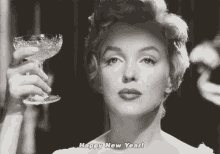 Cheers GIF - Marilyn Monroe Happy New Year Cheers GIFs